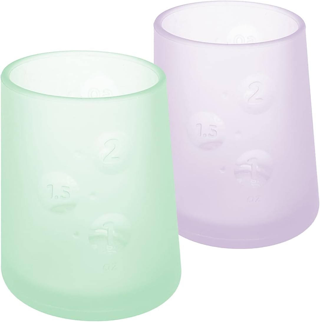 Olababy First Cup | Clear Sense 100% Silicone Infant Trainer Cup | 2oz Medicine Cup for Newborn | Non-Slip & Sloping Design for Tiny Hands & Baby Led Weaning (Mint/Lilac, 2 Cups)