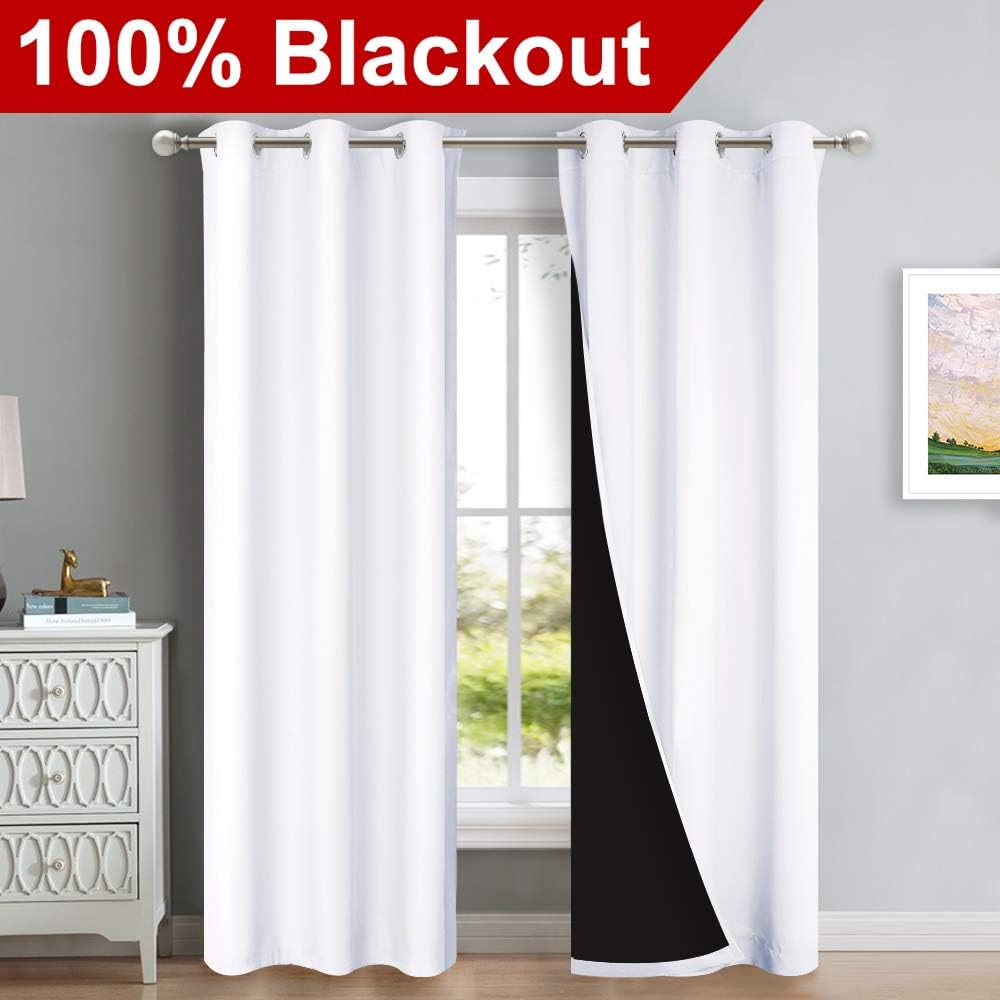 NICETOWN White Blackout Curtains 84 inches Long, Full Light Blocking Drapes with Black Liner for Nursery, Thermal Insulated Draperies for Hall, Villa (2 Pieces, 42 inches Wide Each Panel, Pure White)