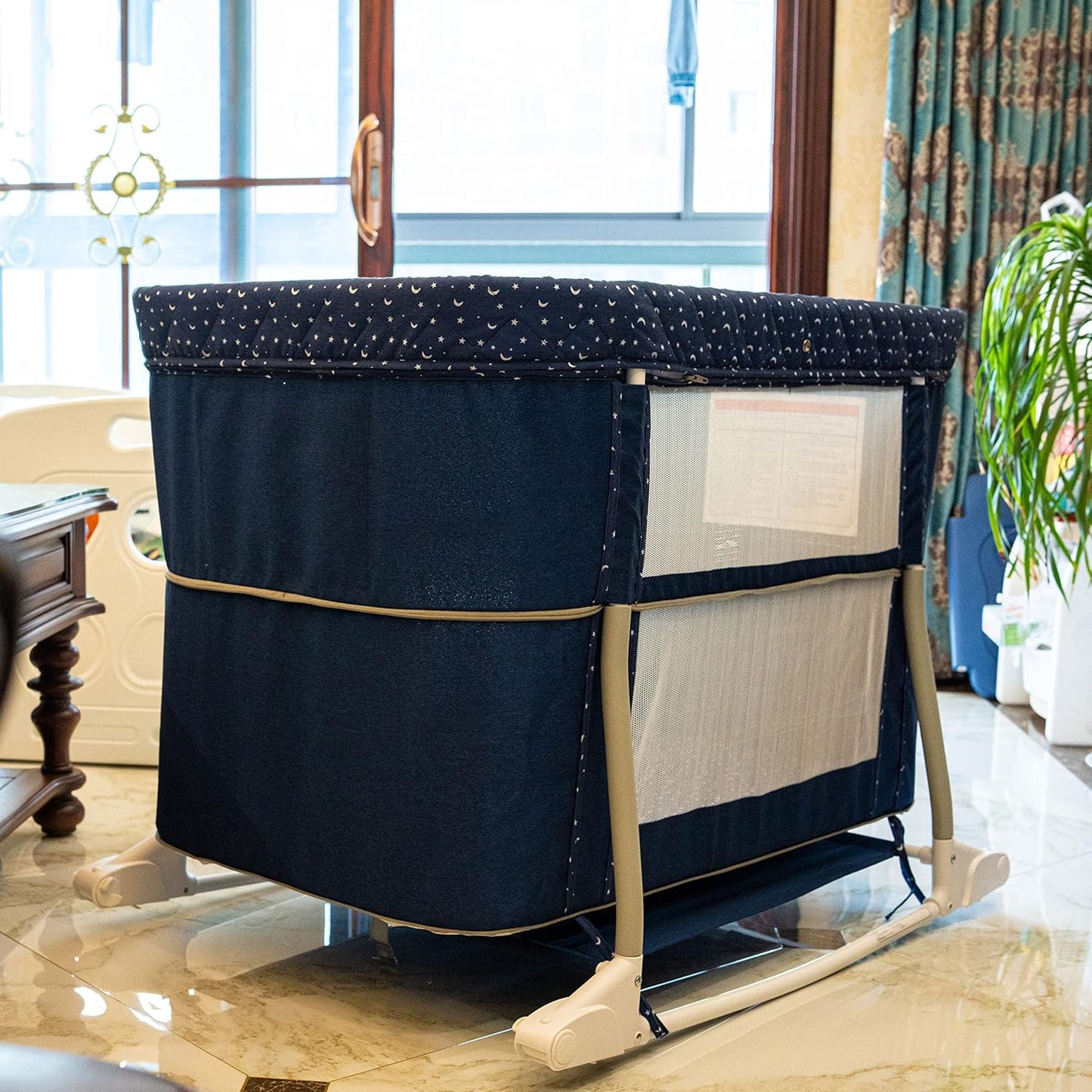 Newborn Portable Bassinet on Wheels for Baby 3 in 1 Bedside Sleeper Rocking Crib Playard with Breathable Mesh Cover Detachable Mosquito Net and Music Box Multi Mode(Navy Blue)